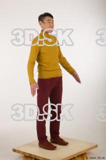 Whole body yellow sweater red trousers brown shoes of Sidney…